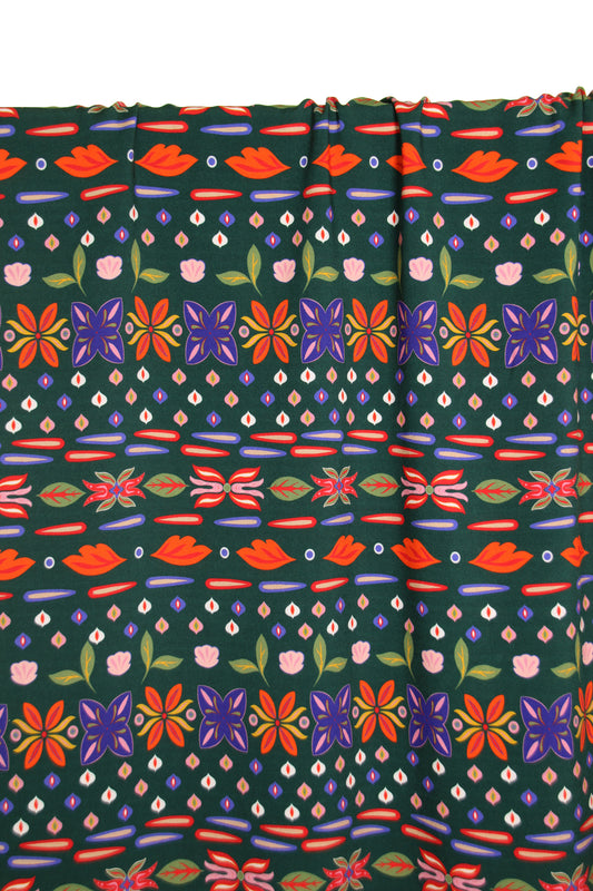 Atelier Jupe dark green viscose with fun flowers fabric